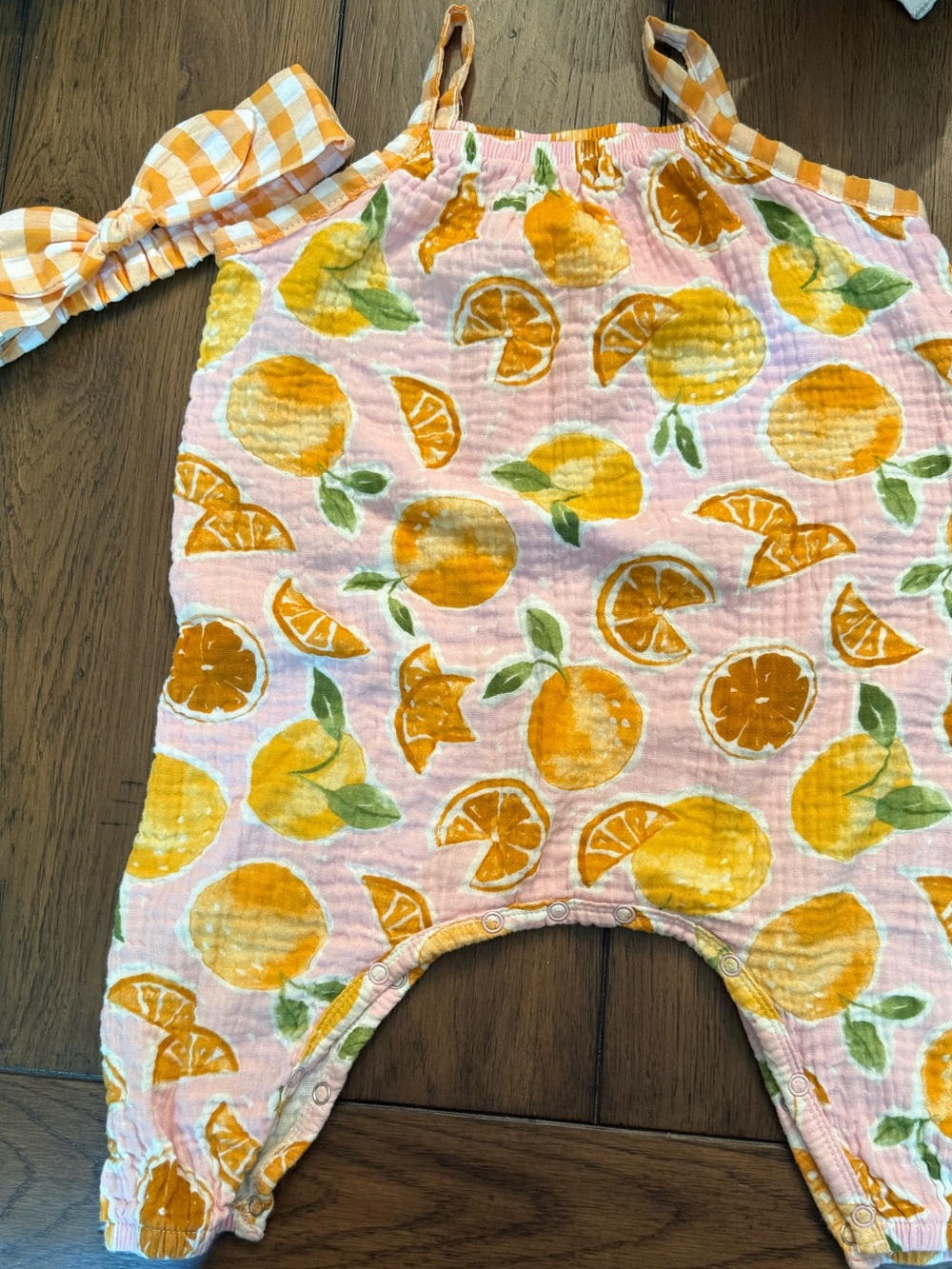 Mud Pie oranges jumpsuit with bow
